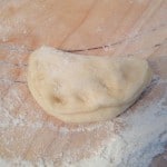 An individual refrigerator roll folded in half with the seam pinched