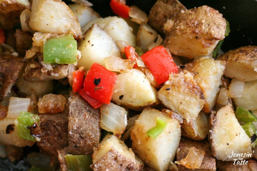 Cooked potatoes, chopped bell pepper and onions