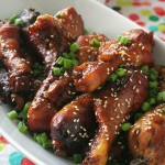 Sweet and sticky Slow Cooker Honey Glazed Chinese Chicken gets crispy from a brief stint under the broiler which makes them perfect for game day.