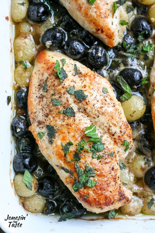 Chicken with grapes and olives in a sauce
