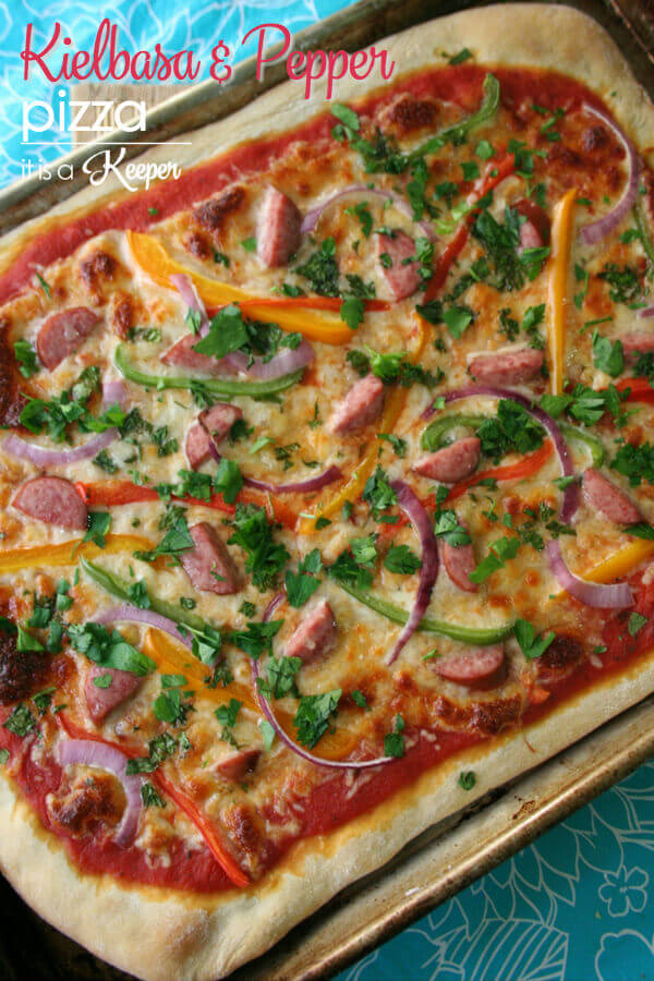 A simple and tasty Kielbasa and Pepper Pizza recipe that can be prepared in less than 30 minutes. The perfect meal for a busy family.