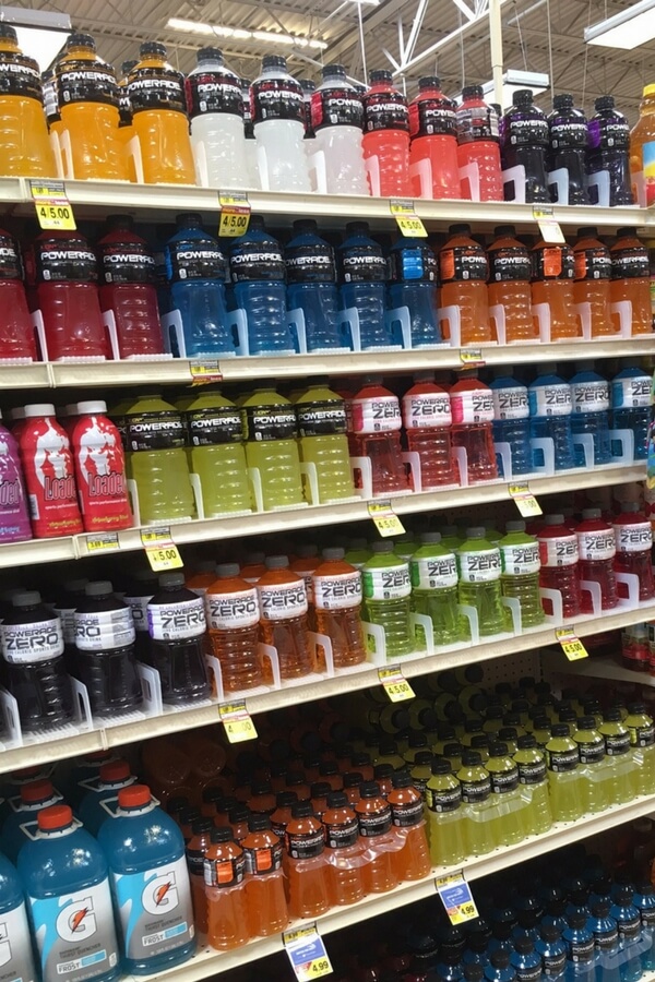 Bottles of powerade on the shelves in the store