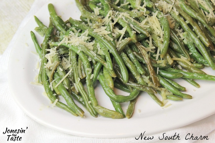 Close up view of Parmesan Garlic Green Beans sauteed and topped with parmesan.