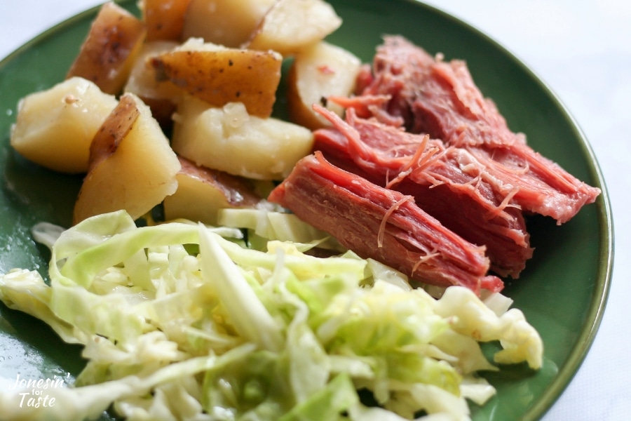 Cabbage, potatoes, and corned beef on a plate