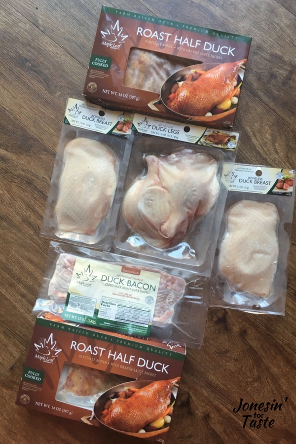 Showing off the various products you can get from Maple Leaf Farms including duck breast, duck bacon, and roast half duck.