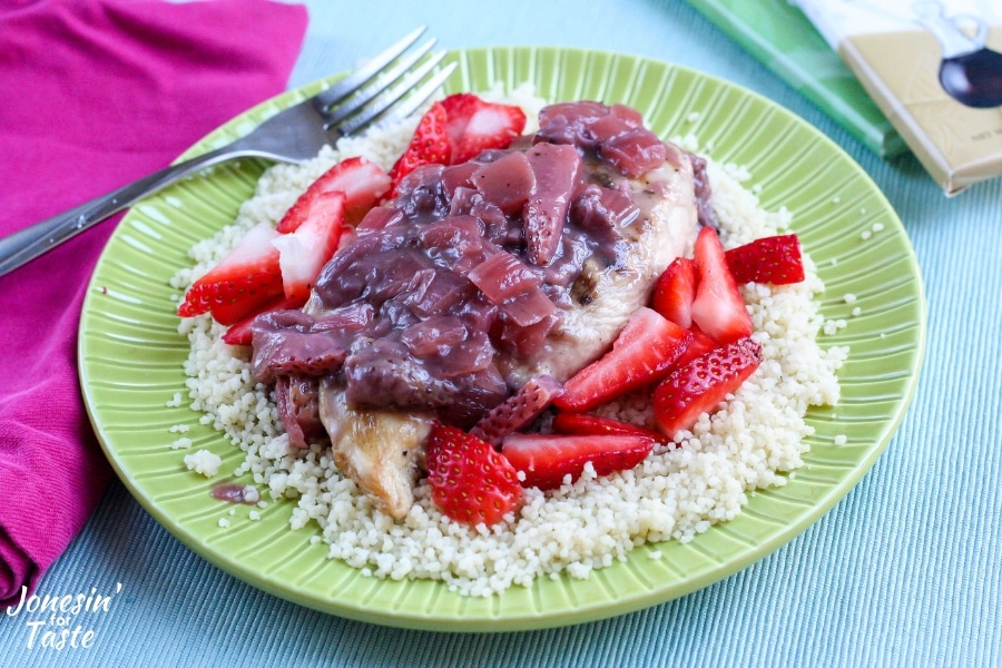 Strawberry Balsamic Chocolate sauce over chicken over couscous and sliced strawberries
