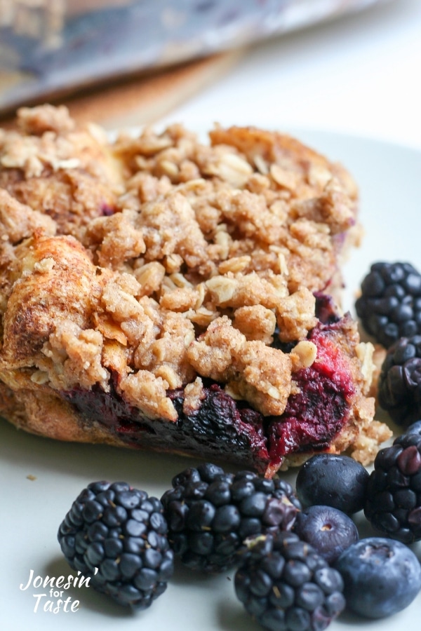 Layers of french toast and berries topped with oatmeal crumble 