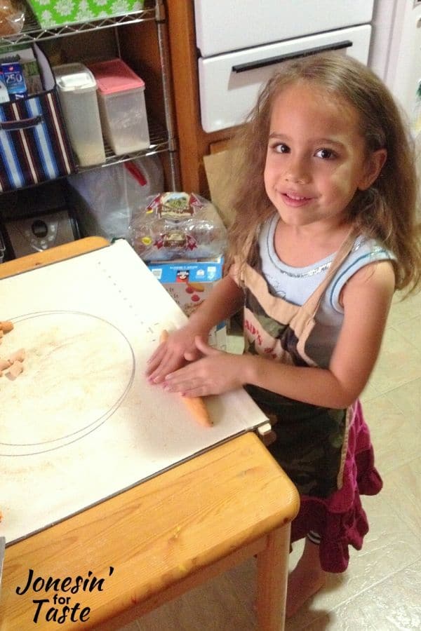 a child making pasta