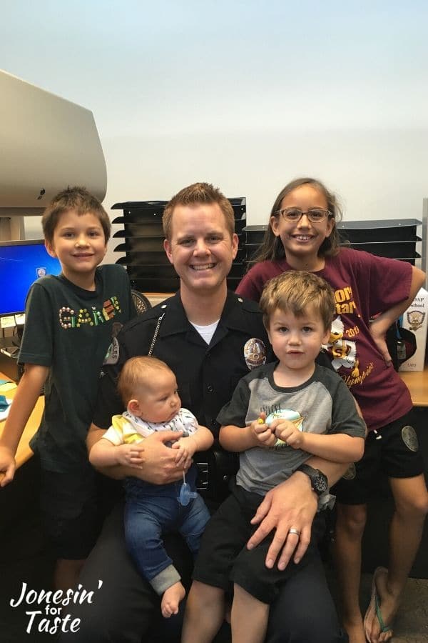 my husband in his LAPD uniform and our 4 children