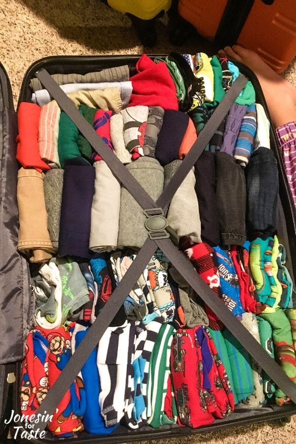 clothes packed in a suitcase in the konmari method